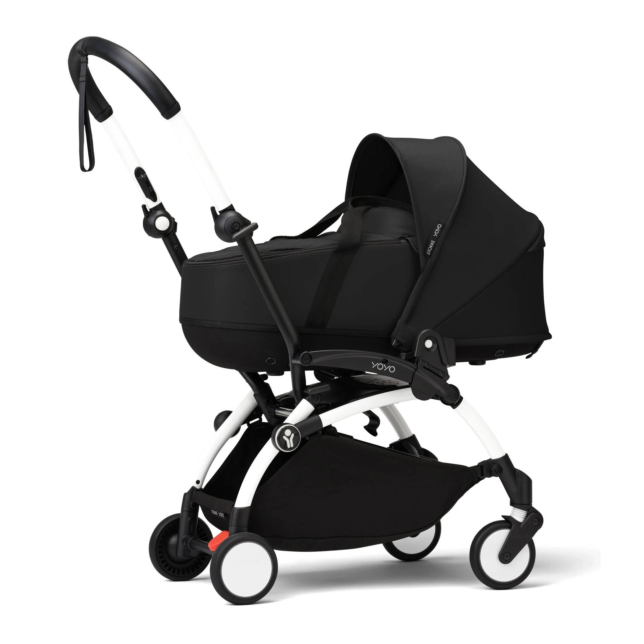 Коляска 2 в 1 Stokke YOYO Newborn Shell White, чорна люлька бік